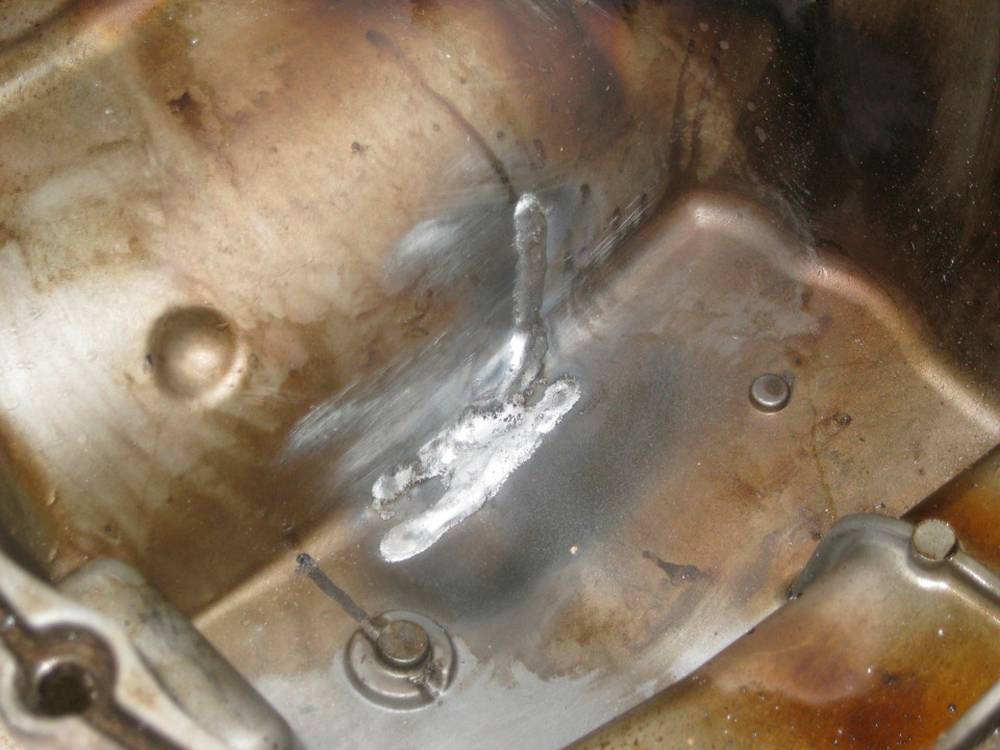 Чем заклеить алюминиевый поддон двигателя?